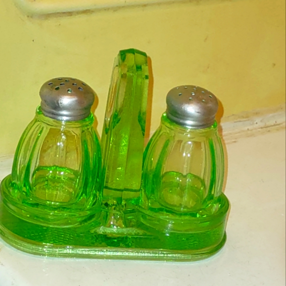 Salt and Pepper shakers with holder